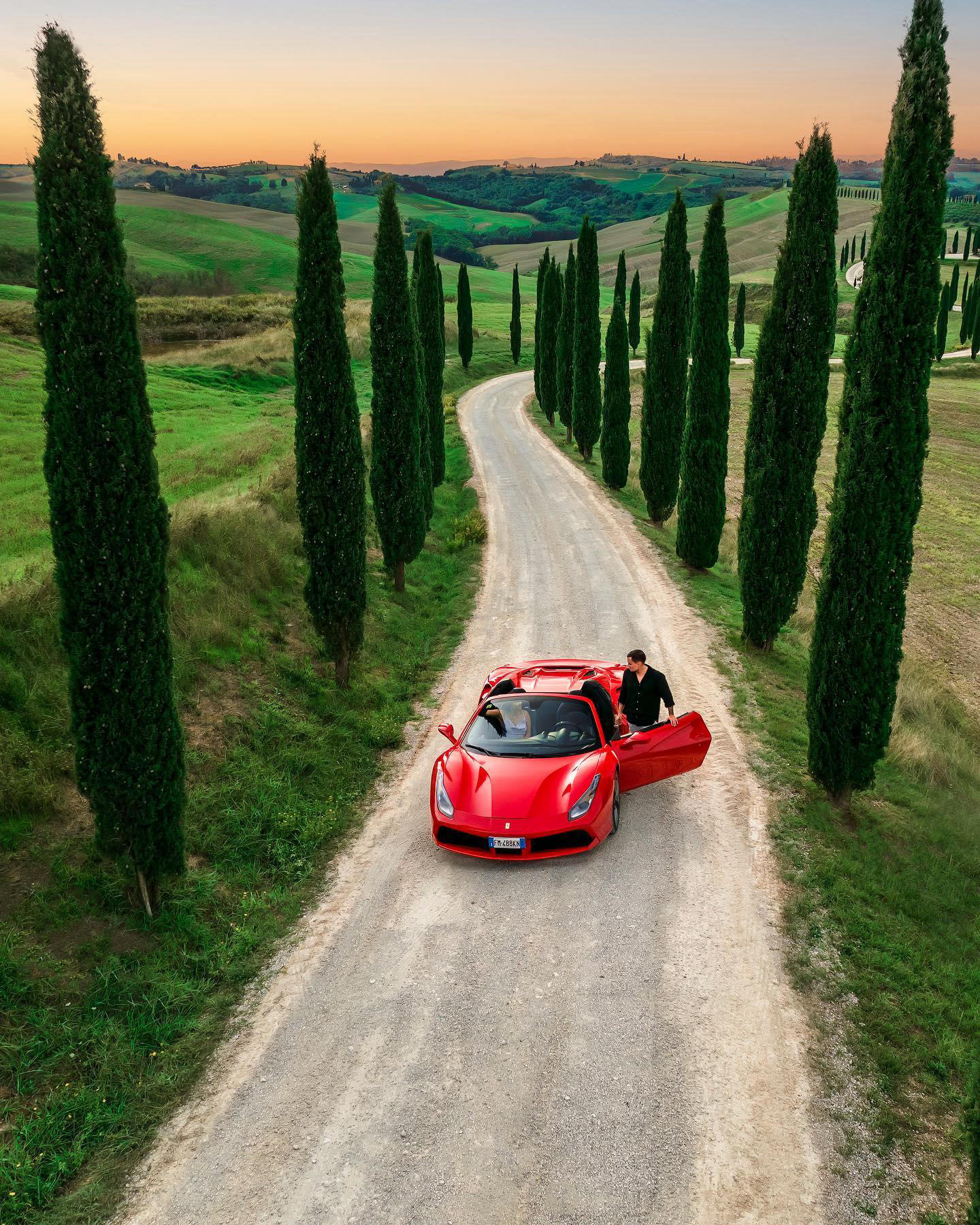 JEREMY AUSTIN - Exploring the magic of Tuscany with a curated itinerary and this stunning red Ferrar
