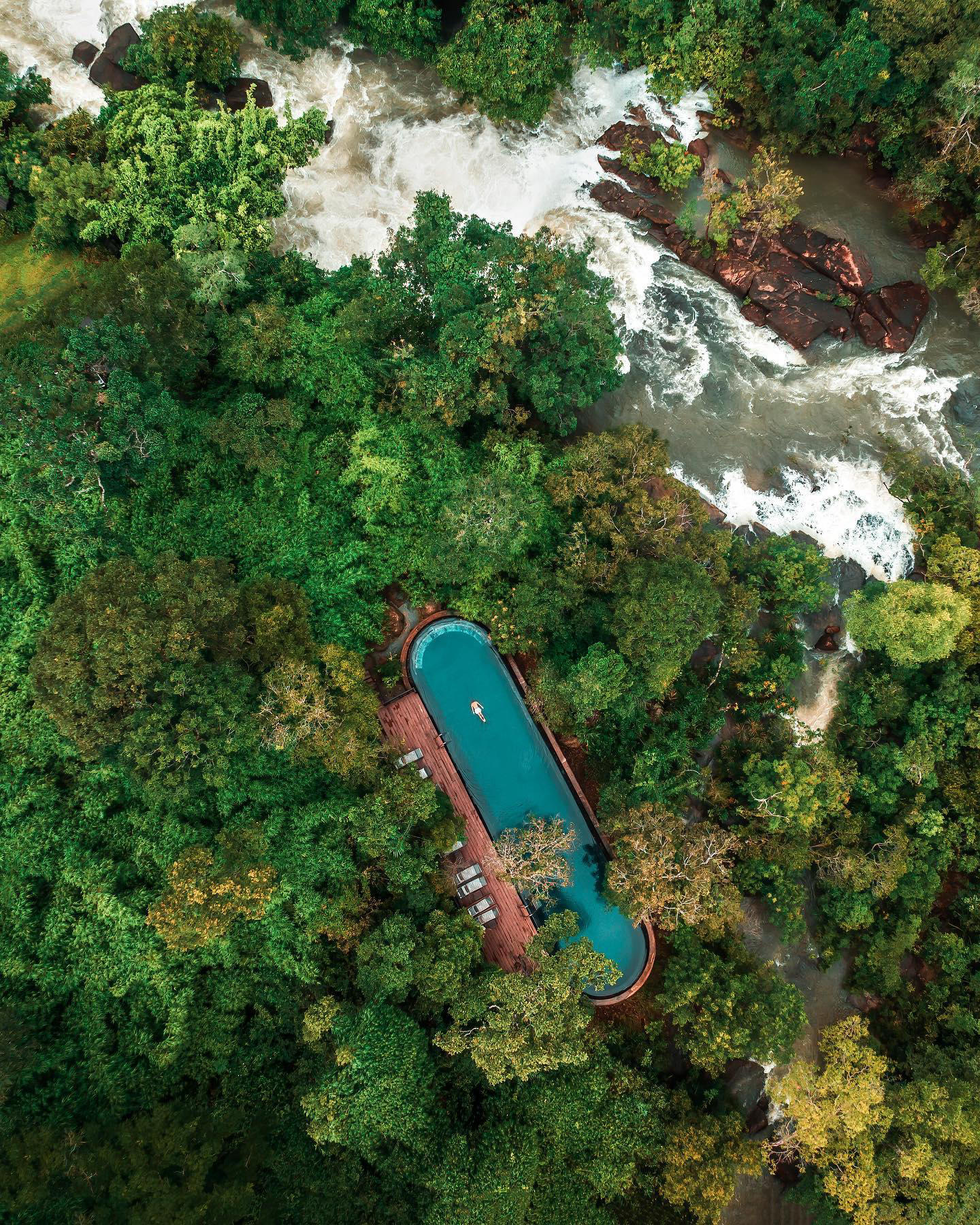 image  1 JEREMY AUSTIN - Surrounded by the Cambodian jungle and perched on the edge of a raging waterfall #sh