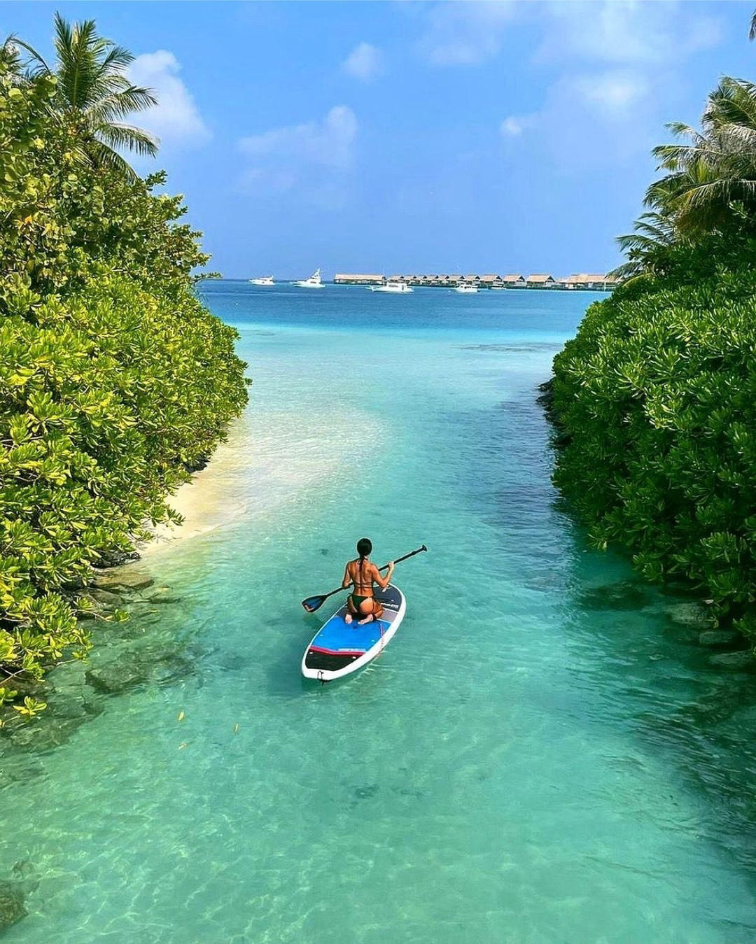 image  1 Sunday's are made for paddle-boarding through our crystal clear lagoon