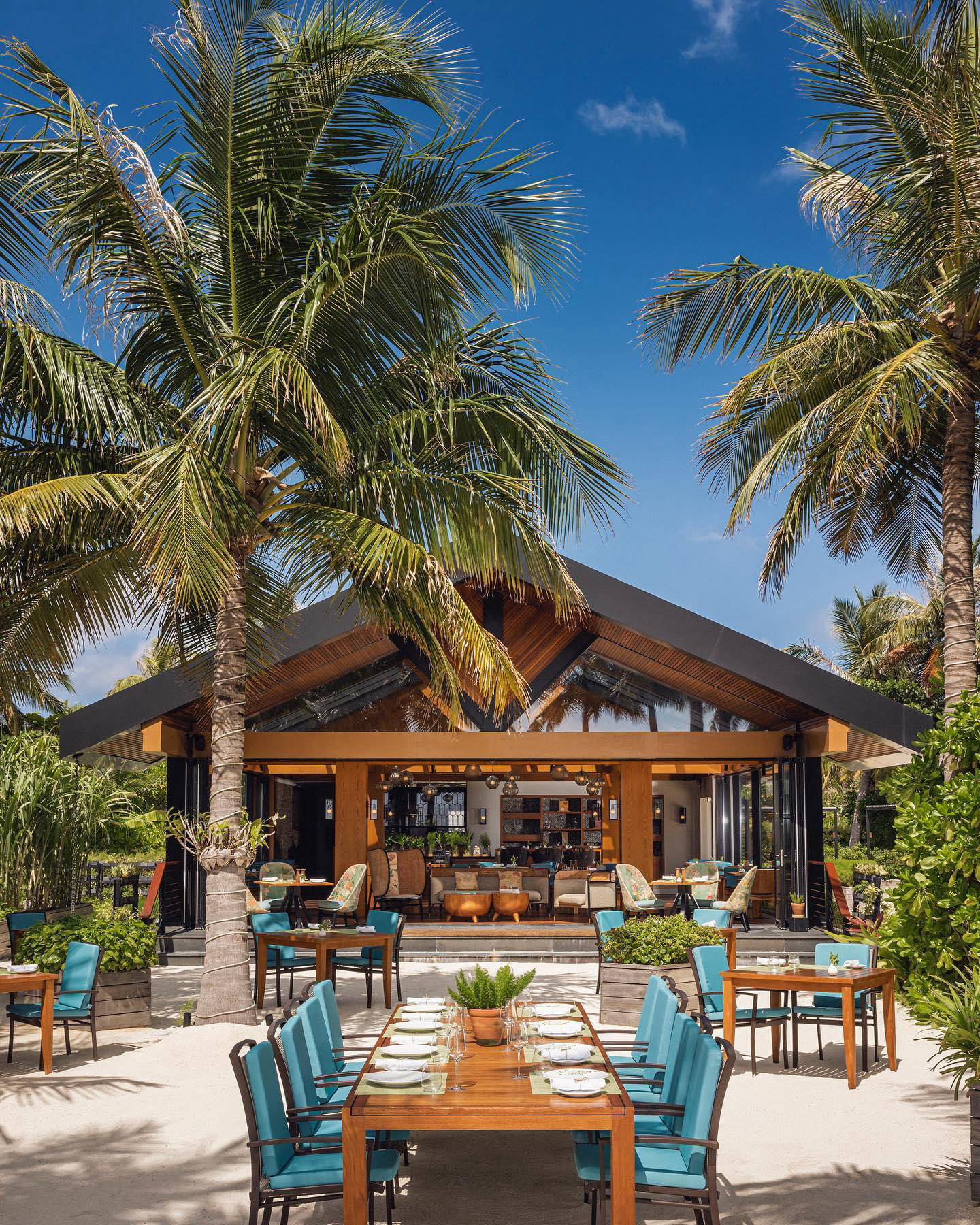 image  1 Waldorf Astoria Maldives - For an authentic garden-to-table experience, dine together in the breezy